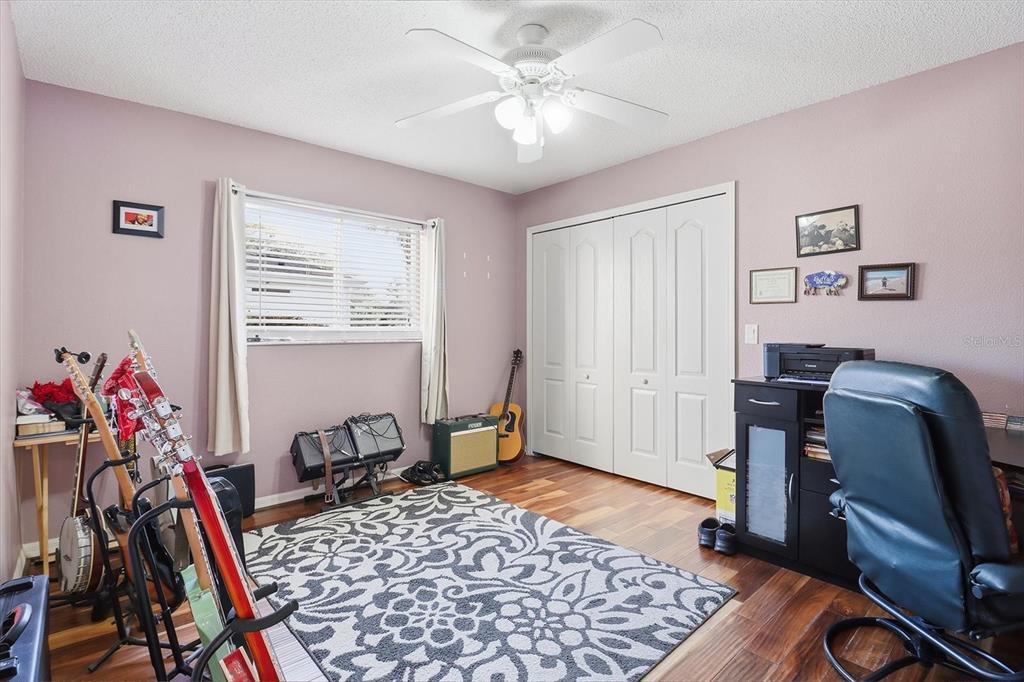 3 Ipomoea Court Homosassa, FL 34446 - Photo 25 of 46 a bedroom with furniture and a window