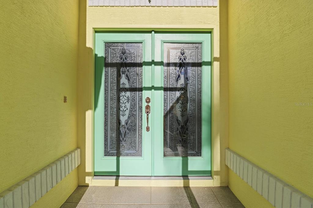 3 Ipomoea Court Homosassa, FL 34446 - Photo 3 of 46 a view of a door front of a house