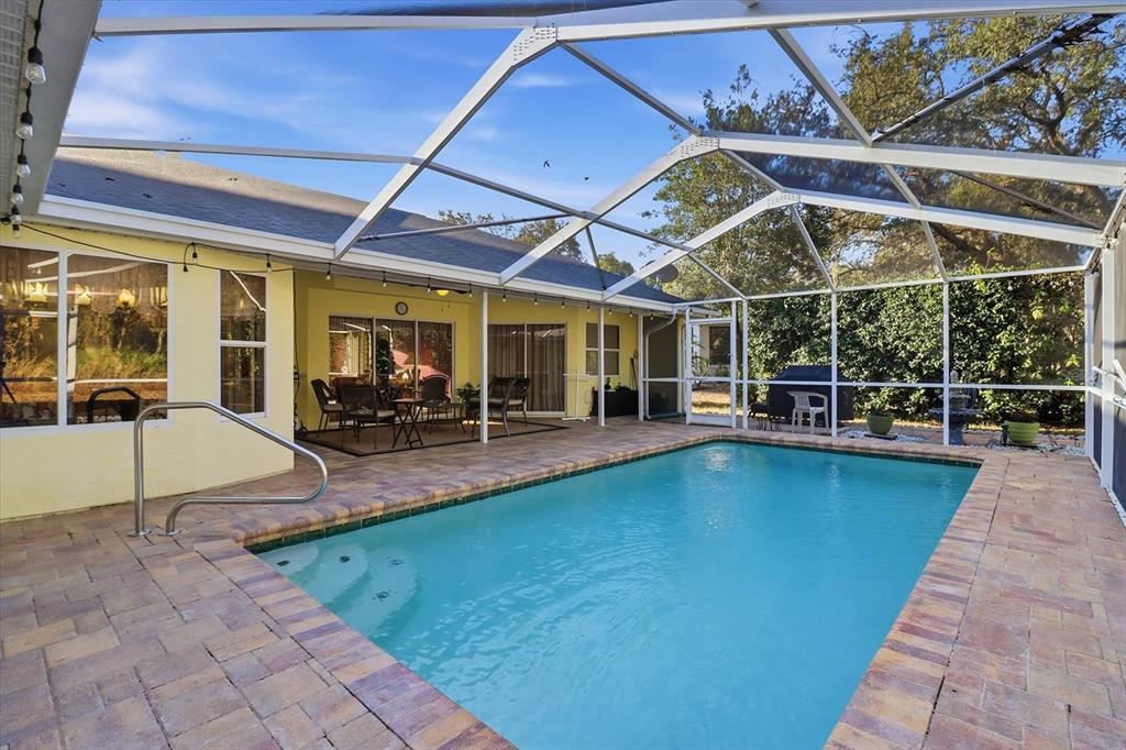 3 Ipomoea Court Homosassa, FL 34446 - Photo 35 of 46 a view of a swimming pool with a patio
