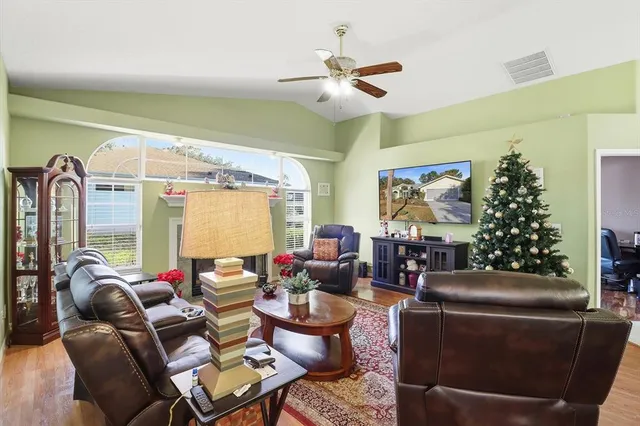 a living room with furniture and a rug