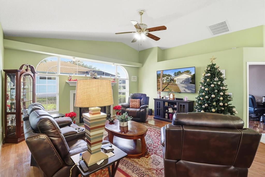 3 Ipomoea Court Homosassa, FL 34446 - Photo 5 of 46 a living room with furniture and a large window
