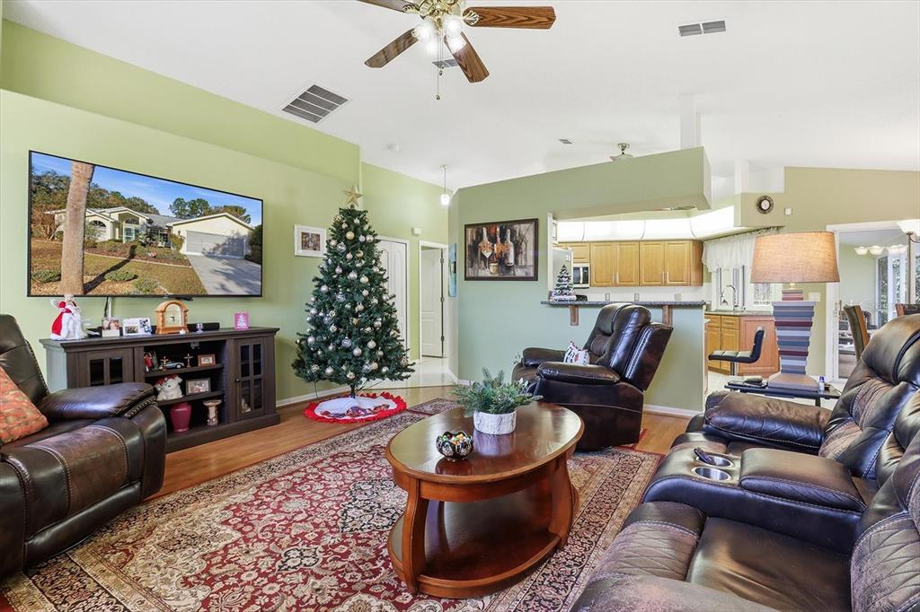 3 Ipomoea Court Homosassa, FL 34446 - Photo 6 of 46 a living room with furniture and a rug