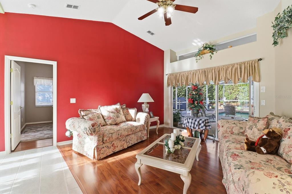 3 Ipomoea Court Homosassa, FL 34446 - Photo 8 of 46 a living room with furniture and a large window