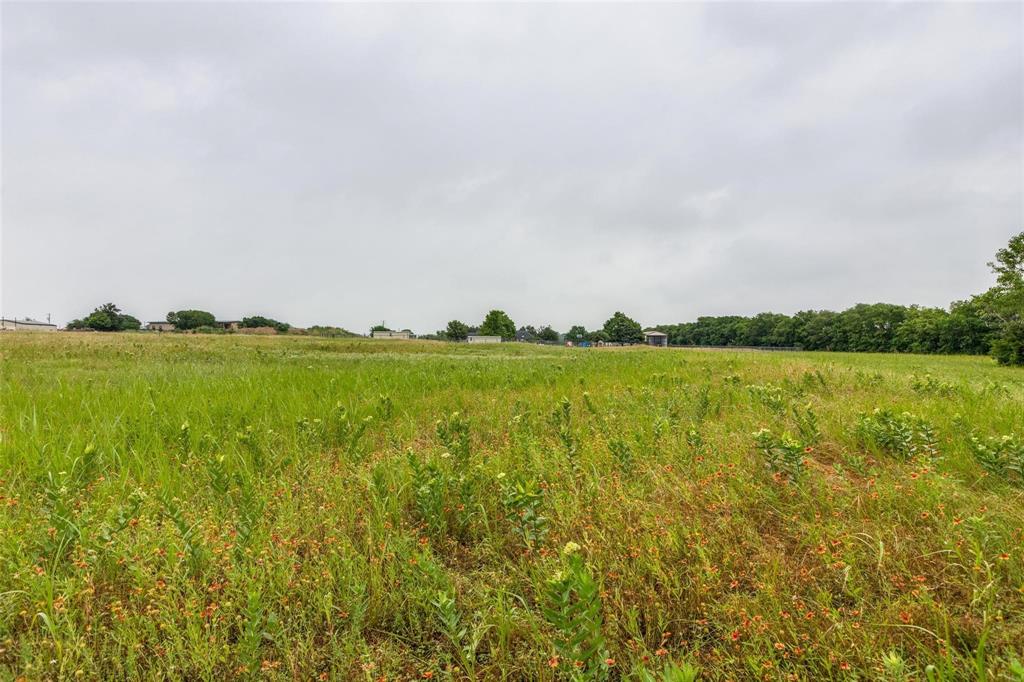 Tbd Baxter Well Road McKinney, TX 75071 - Photo 6 of 9 a view of a lake with houses in the back
