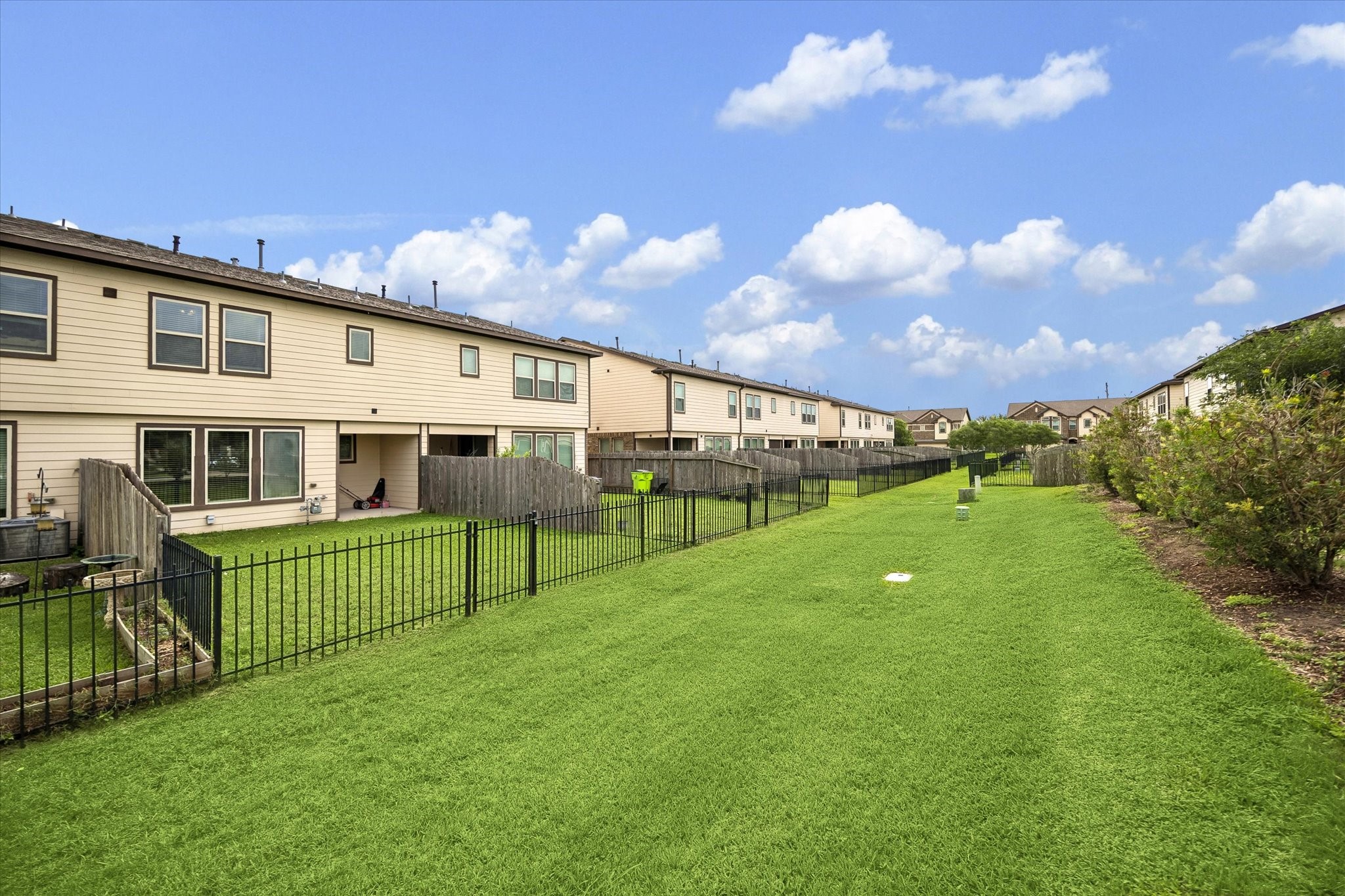 3404 Orch Brg Lane Rosenberg, TX 77471 - Photo 18 of 24 a view of a house with a yard