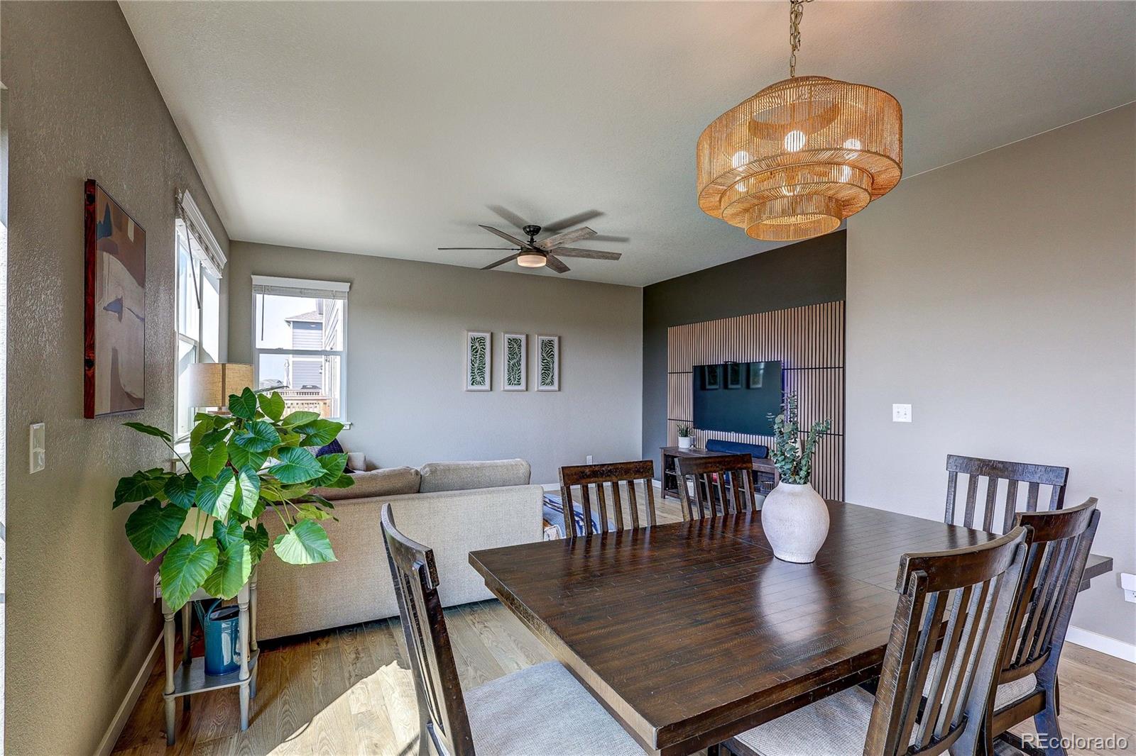1335 Copeland Falls Road Severance, CO 80550 - Photo 13 of 48 a view of a dining room with furniture and wooden floor