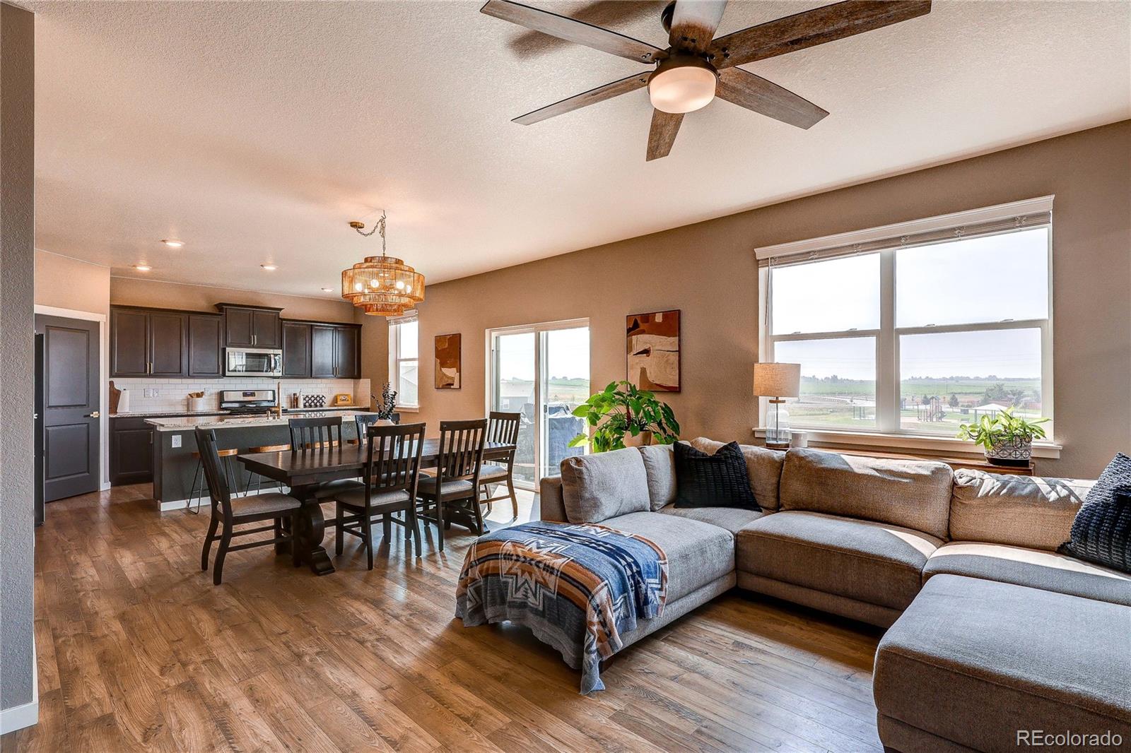 1335 Copeland Falls Road Severance, CO 80550 - Photo 18 of 48 a living room with furniture and a large window
