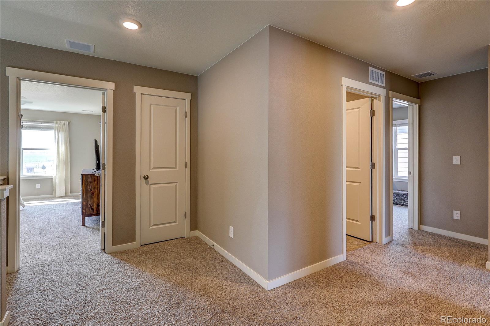 1335 Copeland Falls Road Severance, CO 80550 - Photo 21 of 48 an empty room with closet and a bathroom