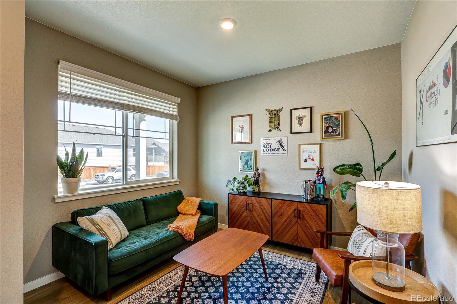 1335 Copeland Falls Road Severance, CO 80550 - Photo 5 of 48 a living room with furniture and a large window