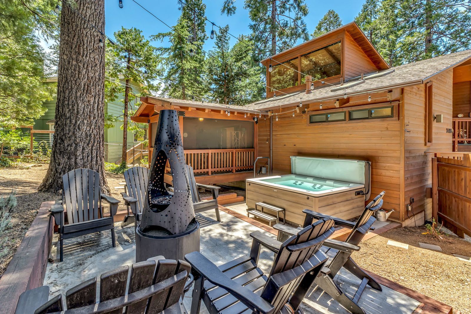 24924 Fern Valley Road Idyllwild, CA 92549 - Photo 61 of 72 a view of backyard of house with seating space