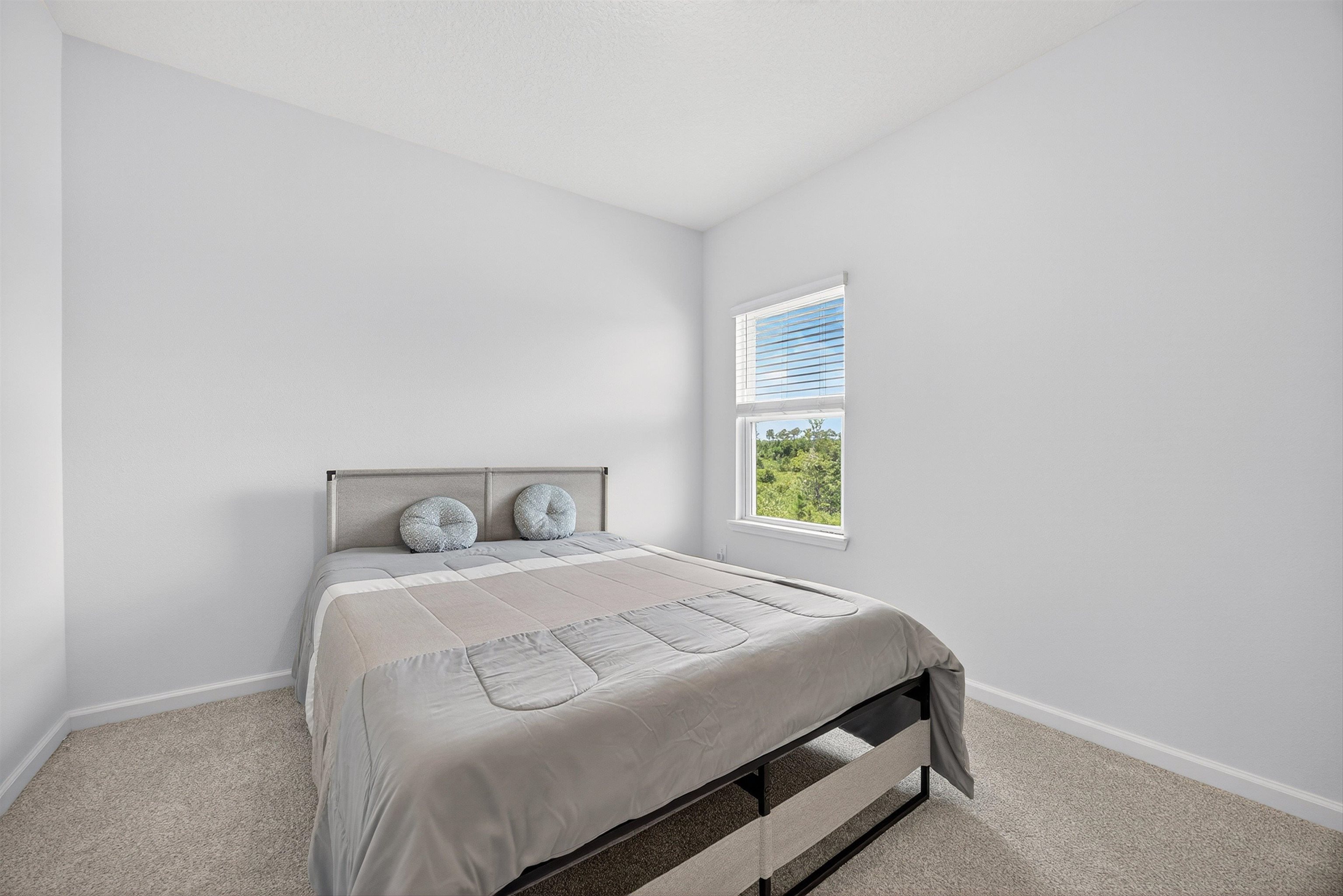 168 Torres Trace St. Augustine, FL 32095 - Photo 25 of 50 a bedroom with a bed and a window