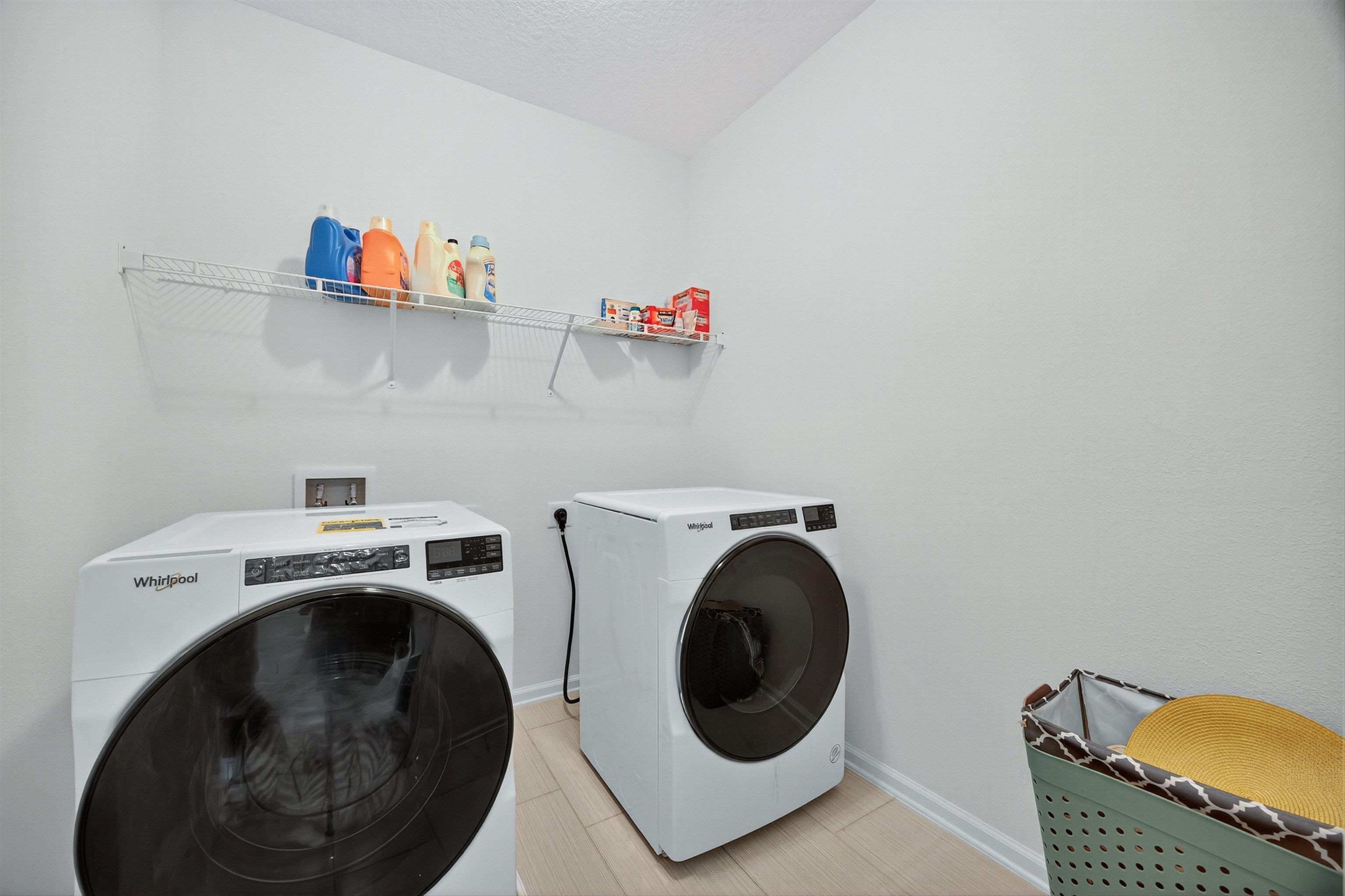 168 Torres Trace St. Augustine, FL 32095 - Photo 28 of 50 a utility room with dryer and washer