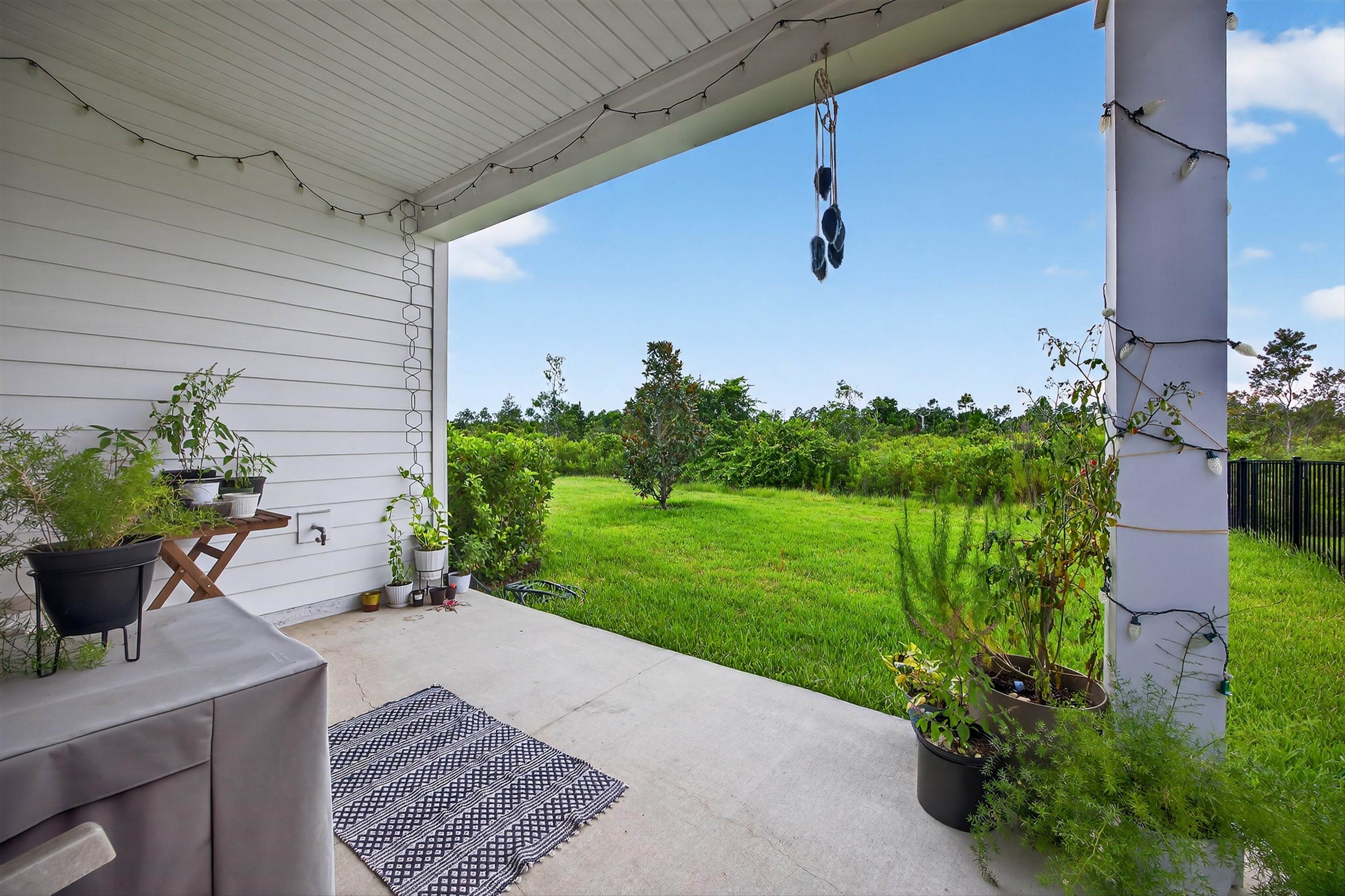 168 Torres Trace St. Augustine, FL 32095 - Photo 29 of 50 a view of a porch with furniture and garden