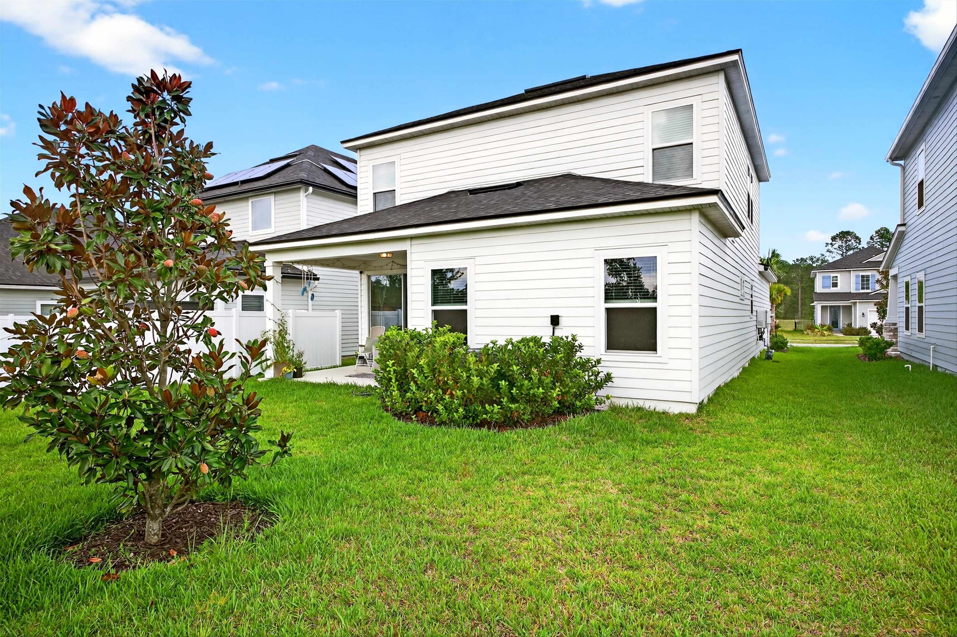 168 Torres Trace St. Augustine, FL 32095 - Photo 33 of 50 a view of house with backyard