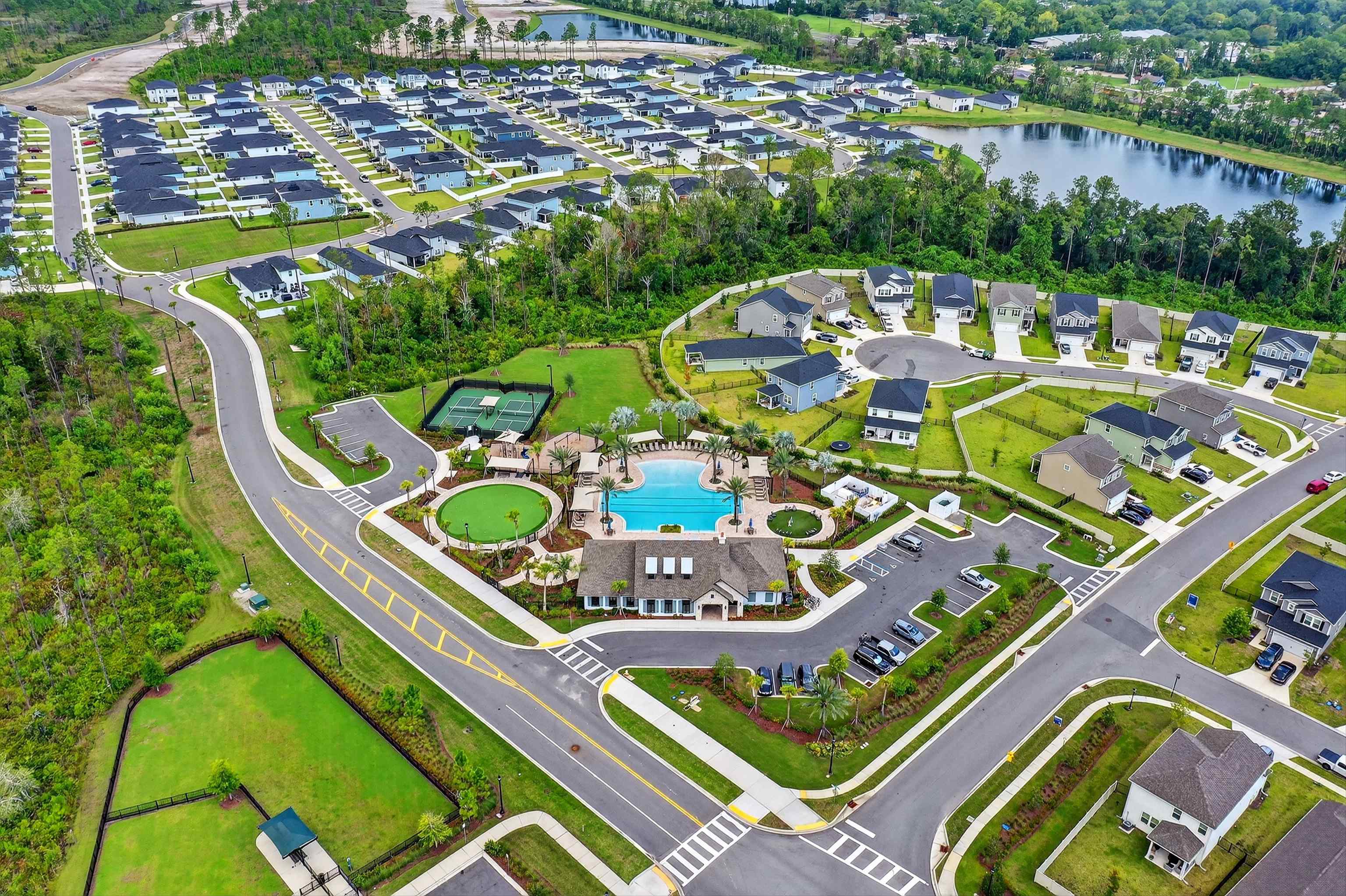 168 Torres Trace St. Augustine, FL 32095 - Photo 41 of 50 an aerial view of a pool patio fire pit and outdoor seating