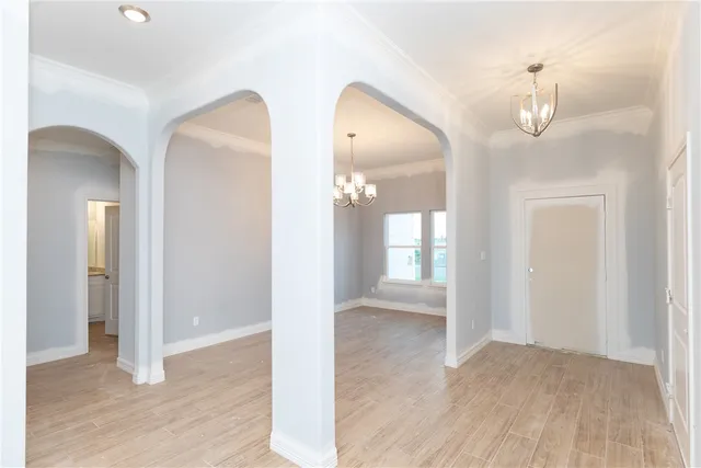 wooden floor in a hall with an entryway