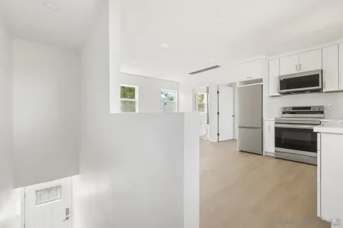a bathroom with a sink a toilet and a shower
