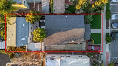 an aerial view of residential building with parking space