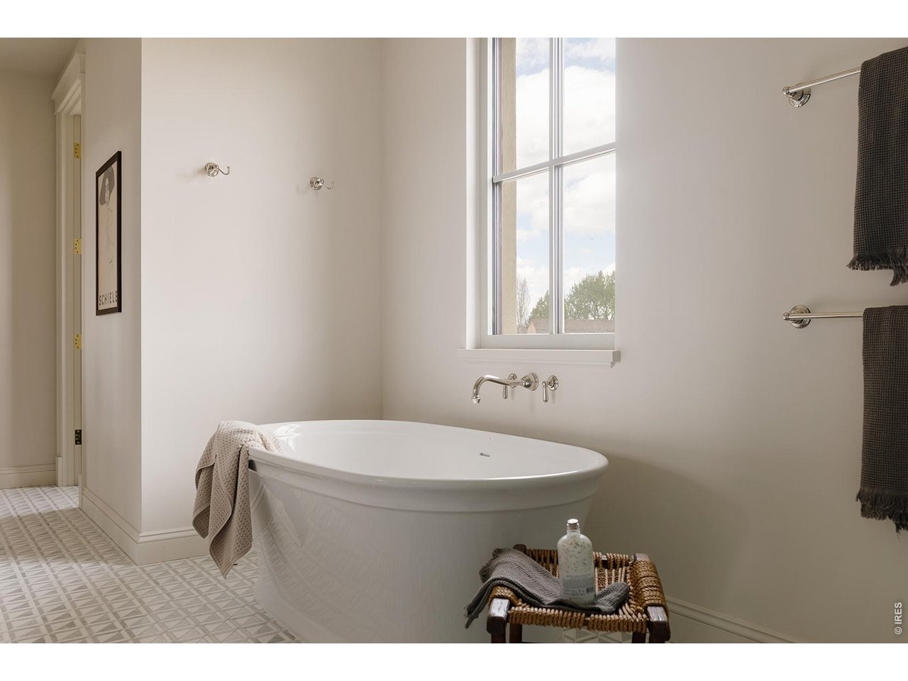 918 Cub Court Fort Collins, CO 80525 - Photo 19 of 45 a bathroom with a sink a toilet and a window