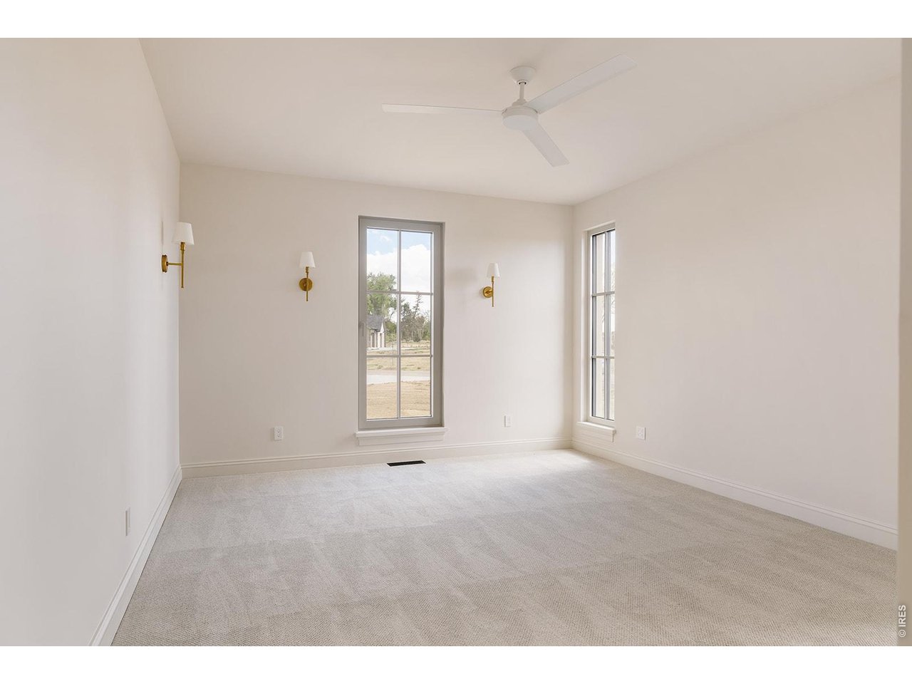 918 Cub Court Fort Collins, CO 80525 - Photo 22 of 45 a view of an empty room with a window