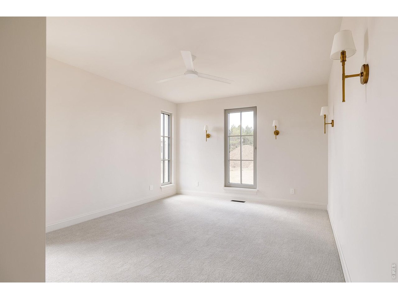 918 Cub Court Fort Collins, CO 80525 - Photo 26 of 45 a view of an empty room with a window