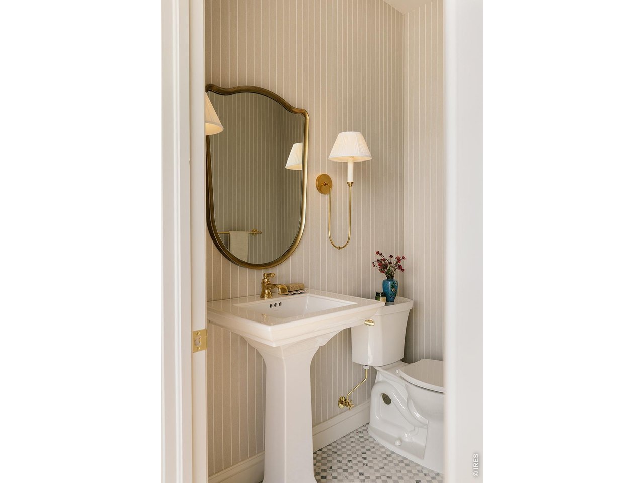 918 Cub Court Fort Collins, CO 80525 - Photo 28 of 45 a bathroom with a sink and a mirror