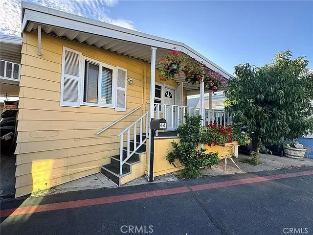a view of house with a street
