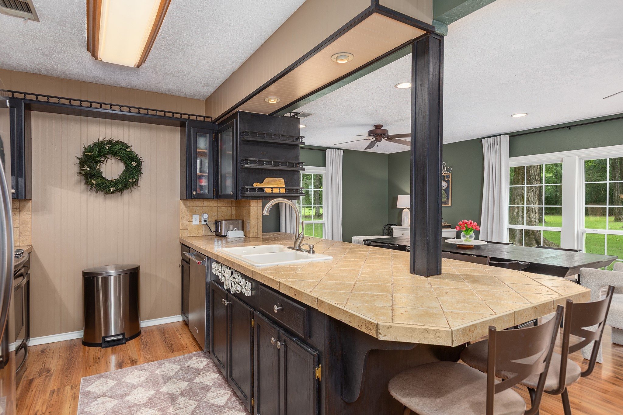 175 County Road 2005 Liberty, TX 77575 - Photo 14 of 42 a kitchen with a table and chairs in it