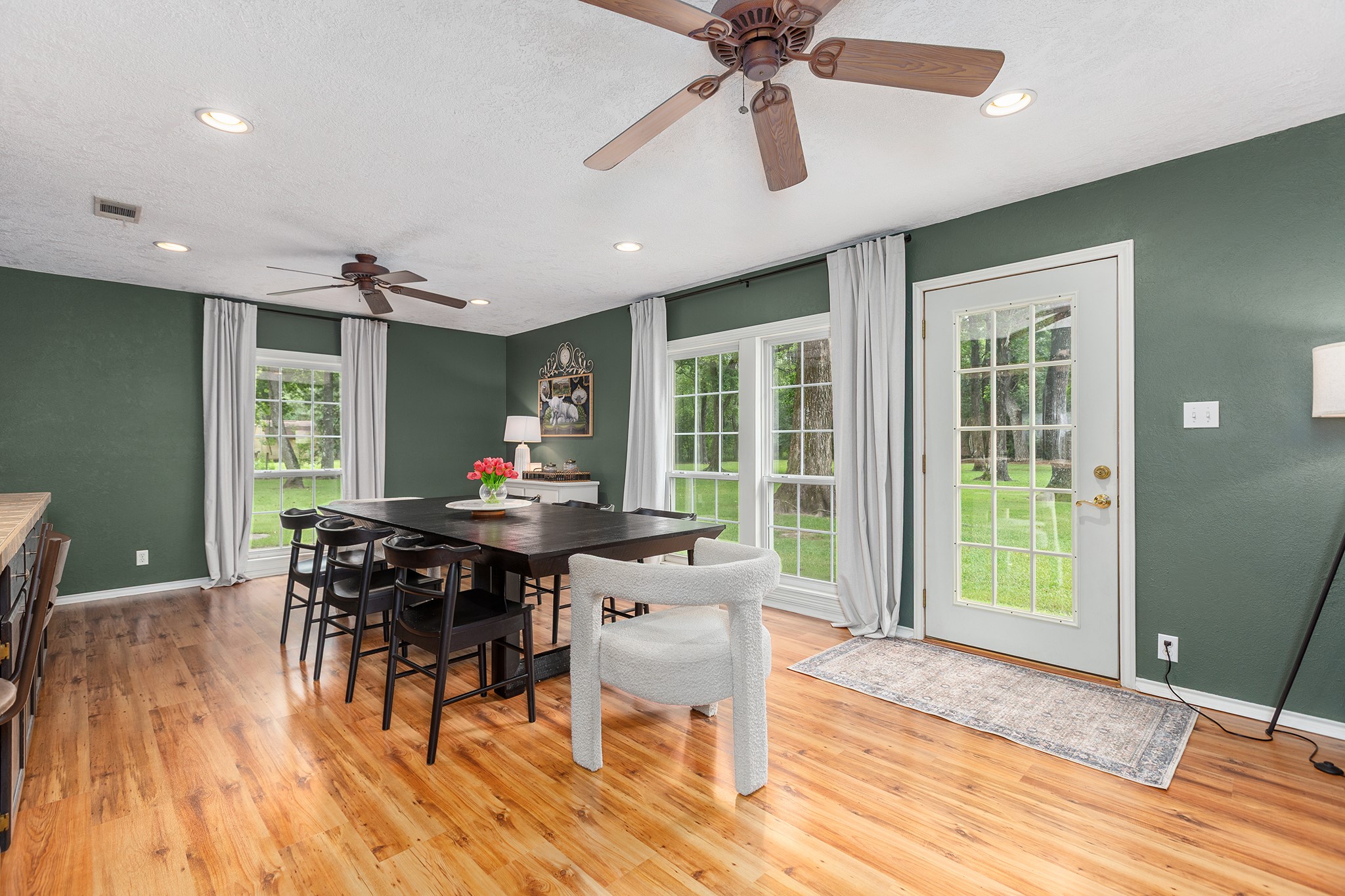 175 County Road 2005 Liberty, TX 77575 - Photo 15 of 42 a view of a dining room with furniture window and wooden floor