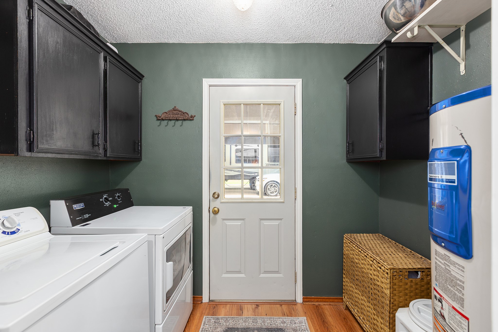 175 County Road 2005 Liberty, TX 77575 - Photo 21 of 42 a view of storage and utility room with washer and dryer