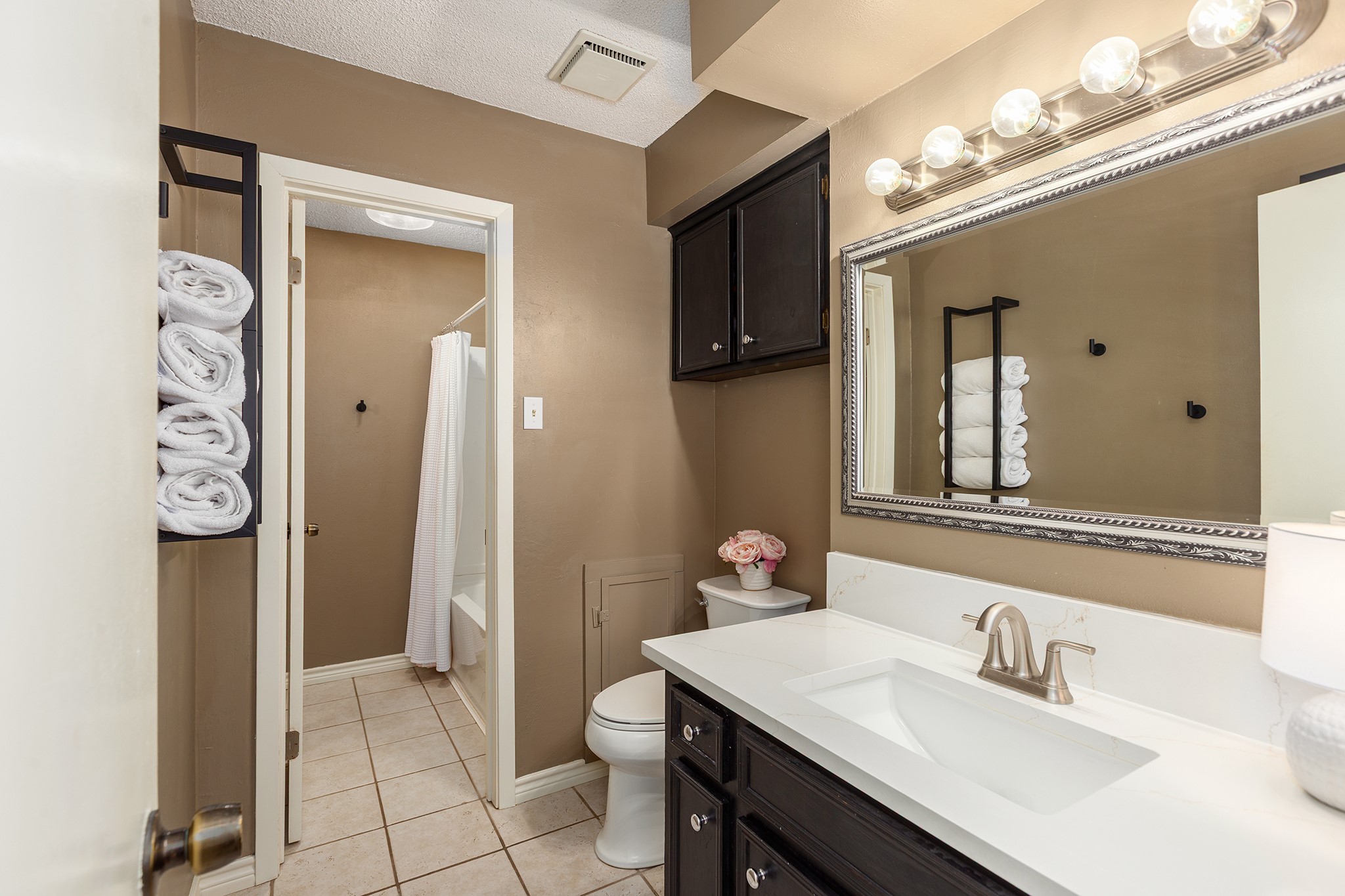 175 County Road 2005 Liberty, TX 77575 - Photo 22 of 42 a bathroom with a sink vanity and a mirror