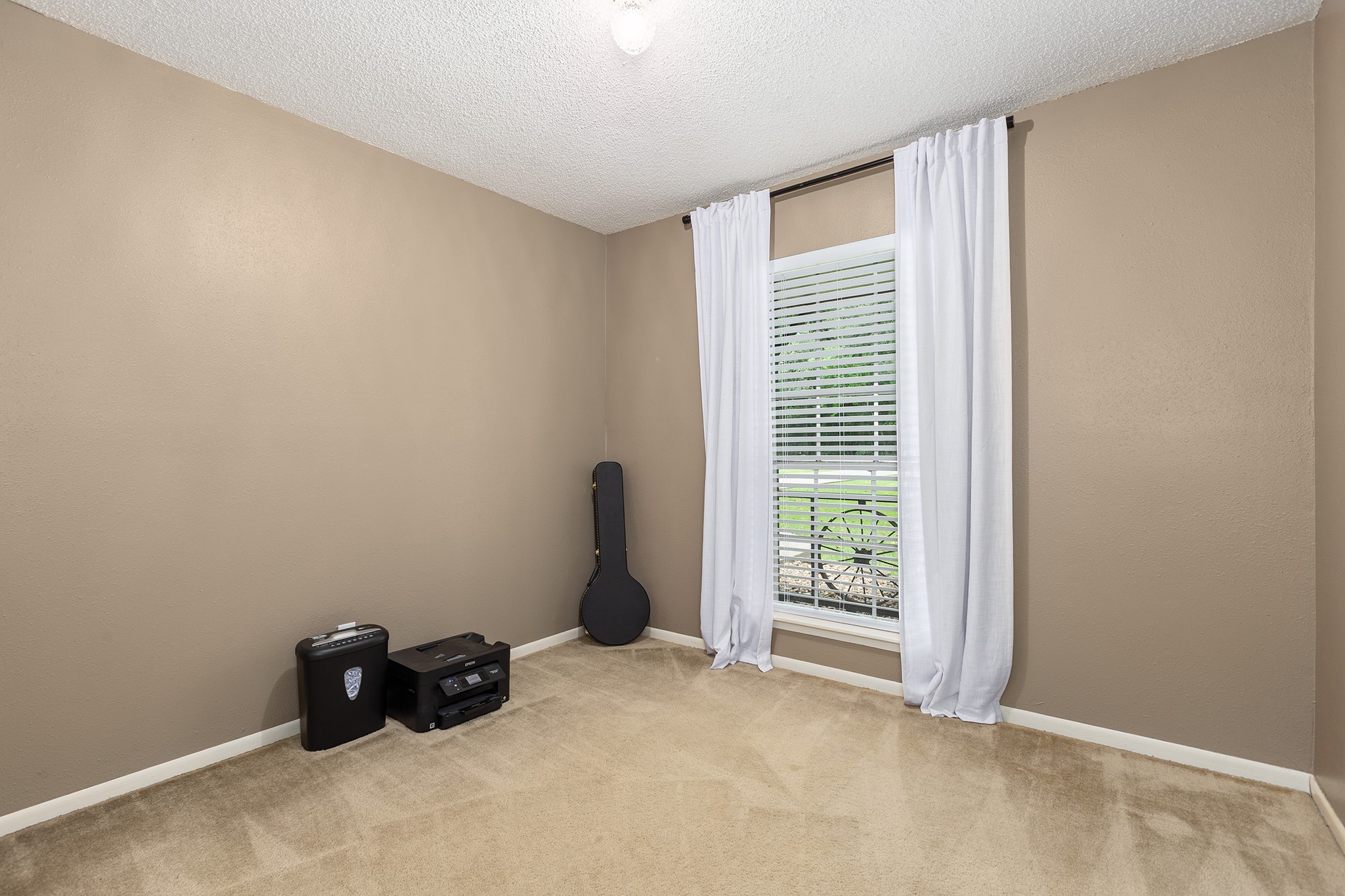 175 County Road 2005 Liberty, TX 77575 - Photo 23 of 42 a view of an empty room with a window