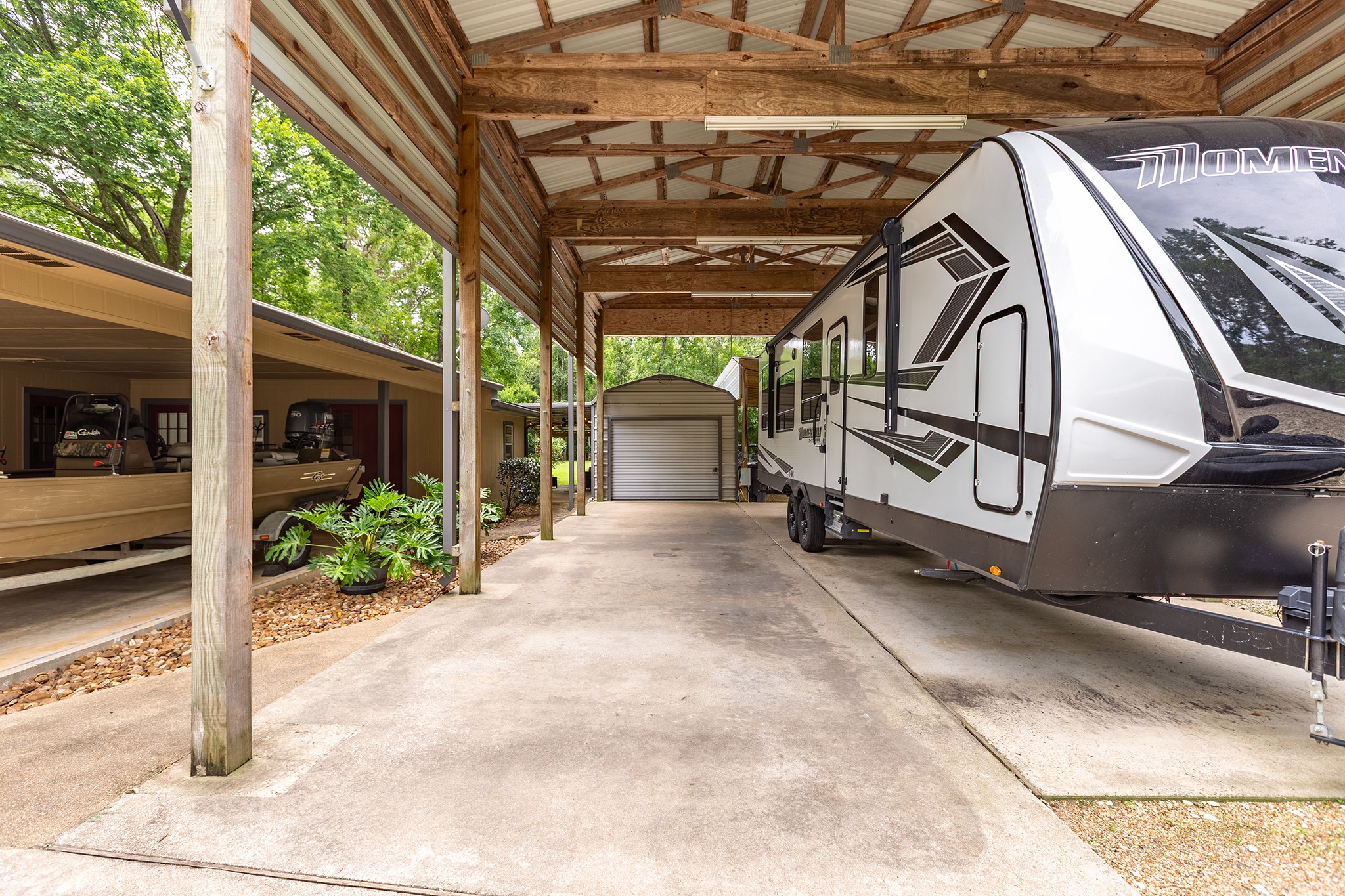 175 County Road 2005 Liberty, TX 77575 - Photo 30 of 42 a view of porch with furniture and garden