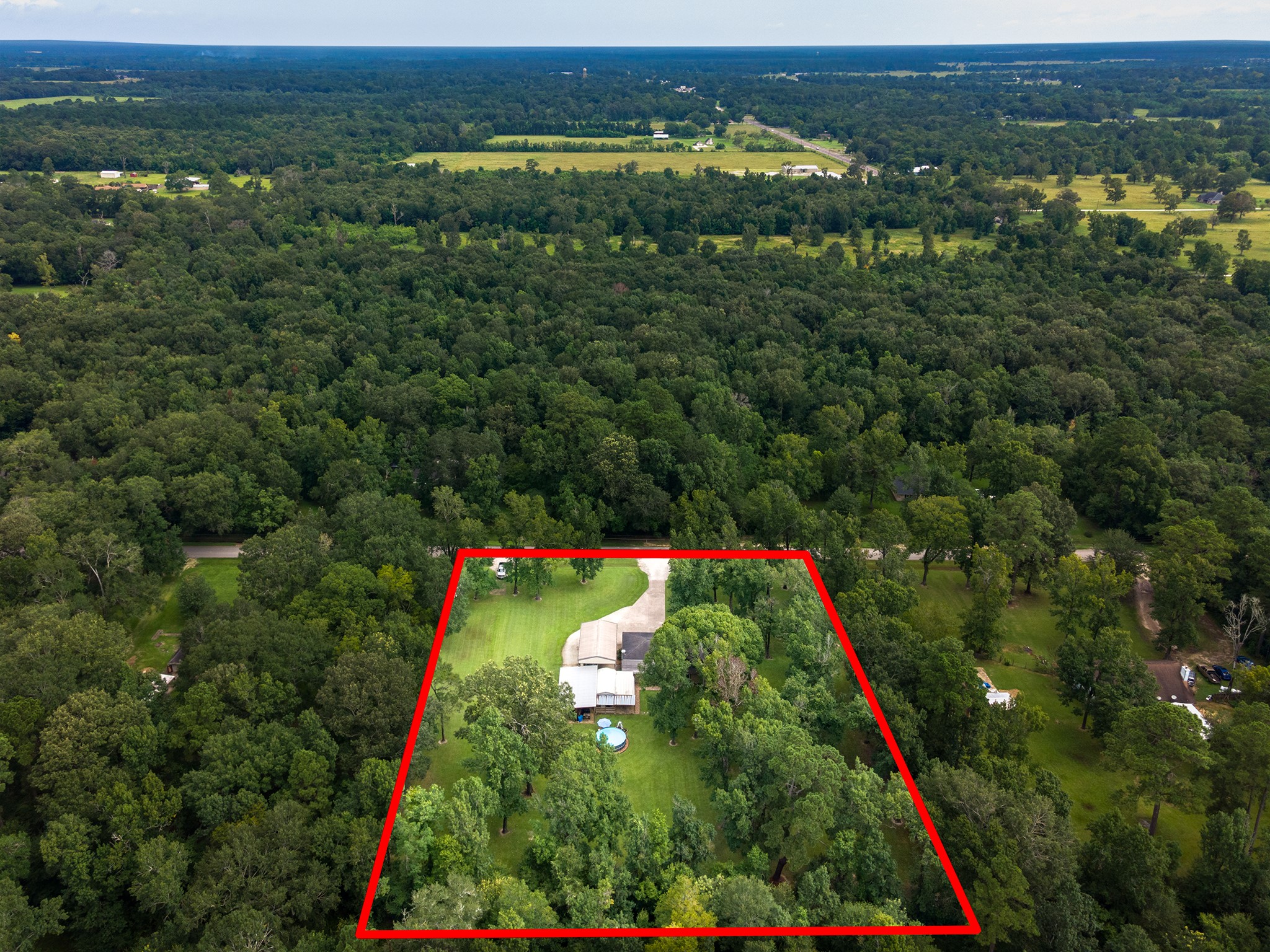 175 County Road 2005 Liberty, TX 77575 - Photo 32 of 42 a view of a field with an ocean