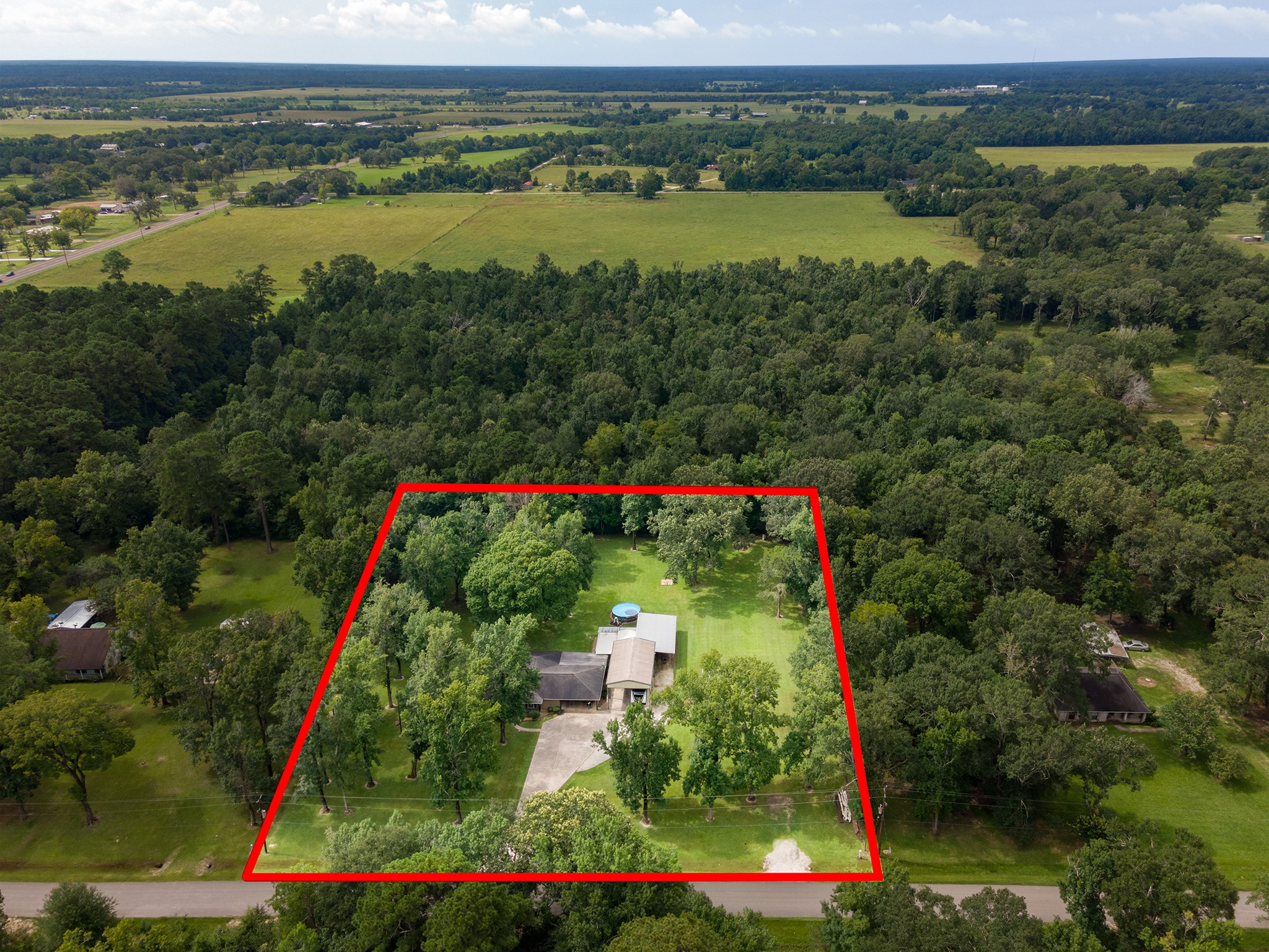 175 County Road 2005 Liberty, TX 77575 - Photo 33 of 42 a view of a lake with a mountain and a lake view