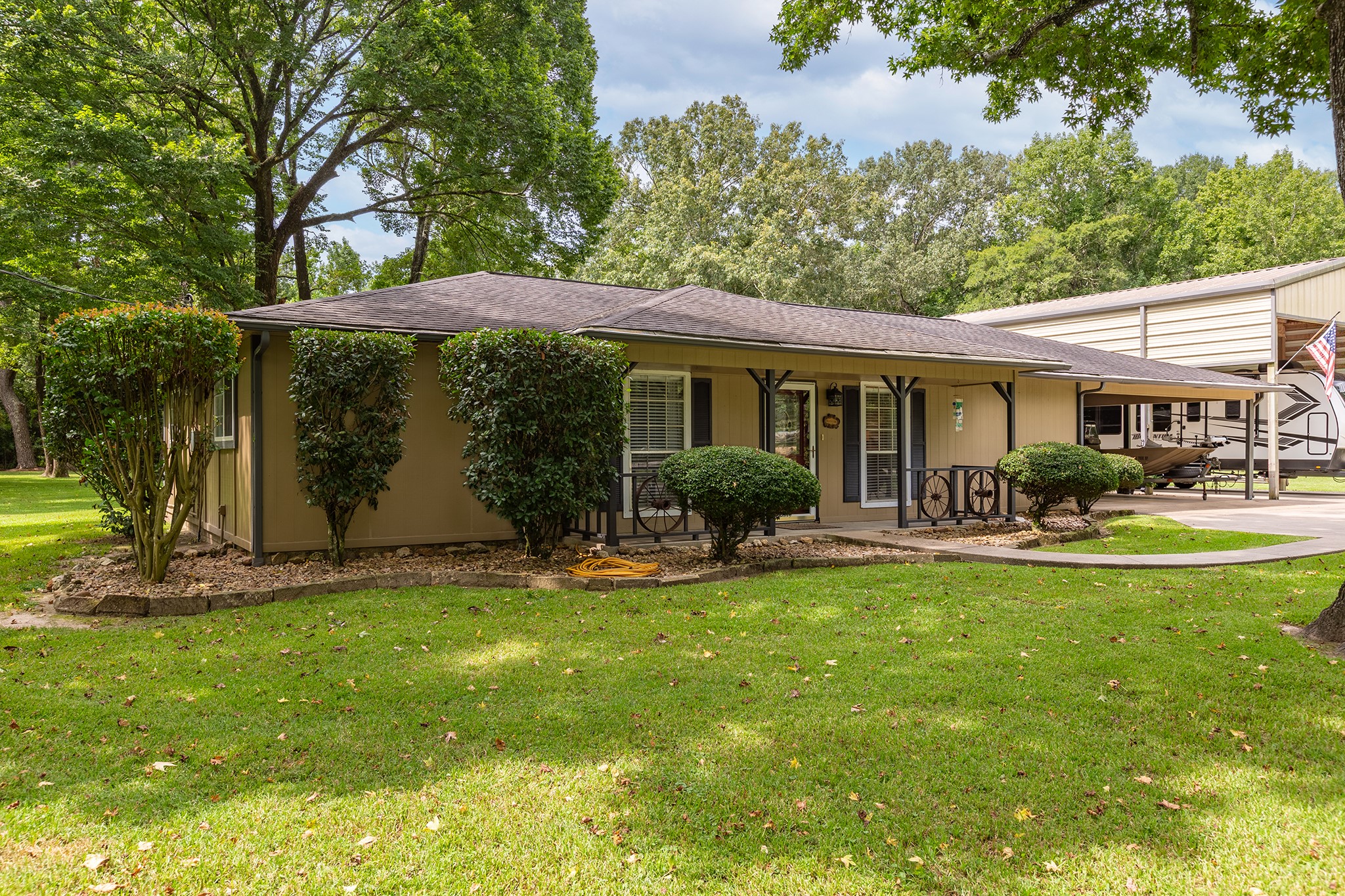 175 County Road 2005 Liberty, TX 77575 - Photo 37 of 42 a view of a chair and table in backyard of the house