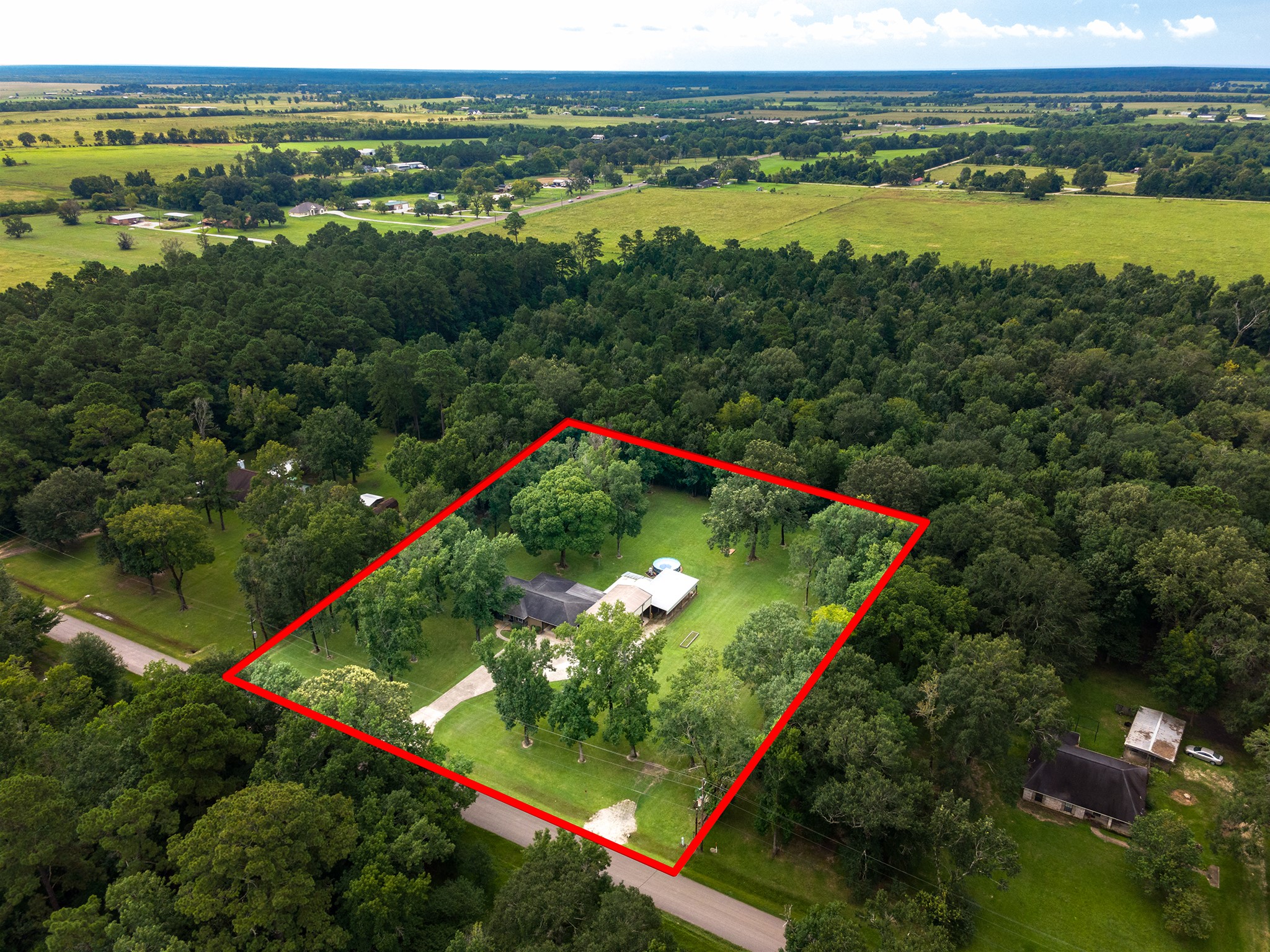 175 County Road 2005 Liberty, TX 77575 - Photo 4 of 42 a view of a lake with a mountain