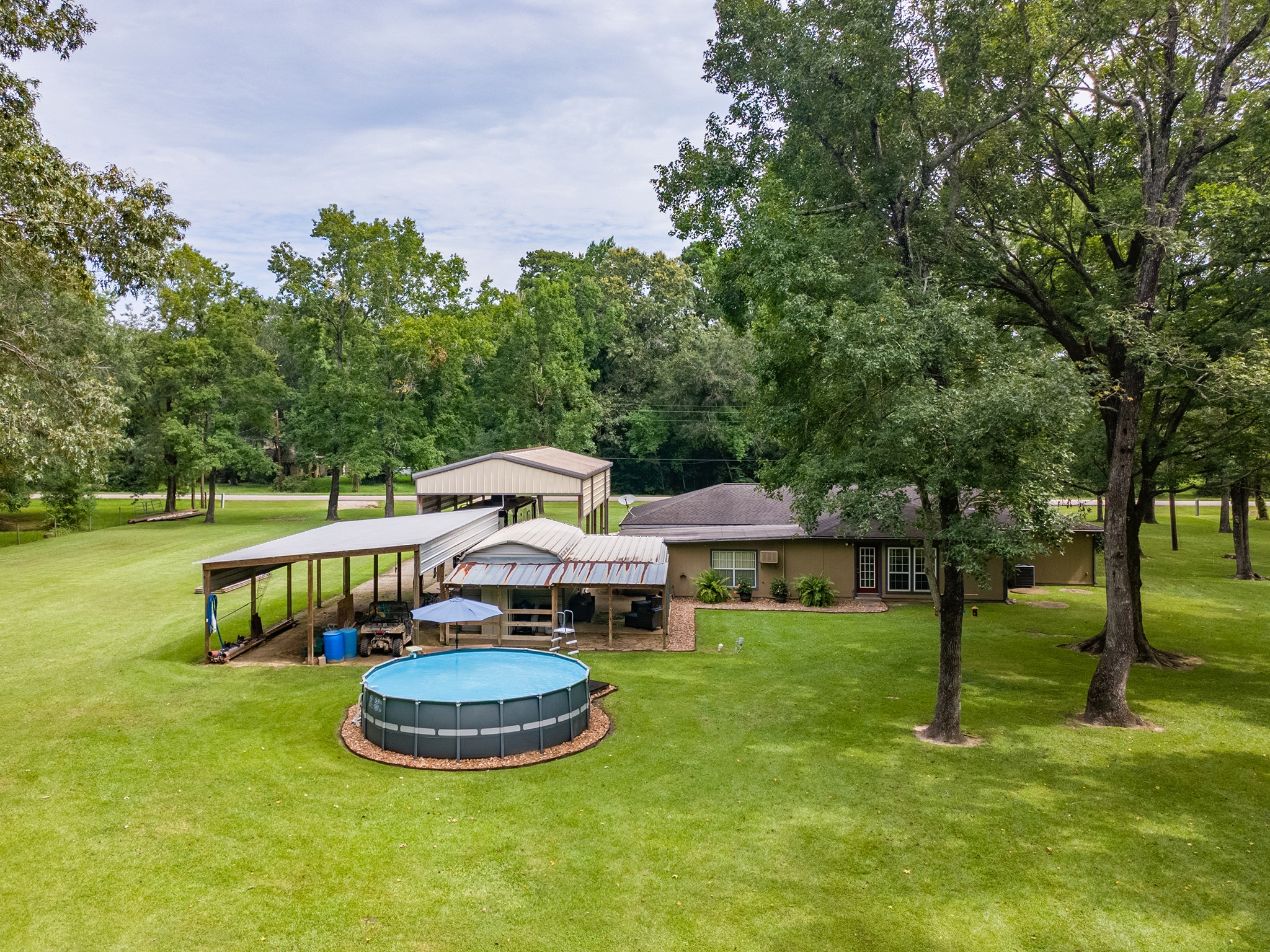 175 County Road 2005 Liberty, TX 77575 - Photo 5 of 42 a garden view with a seating space