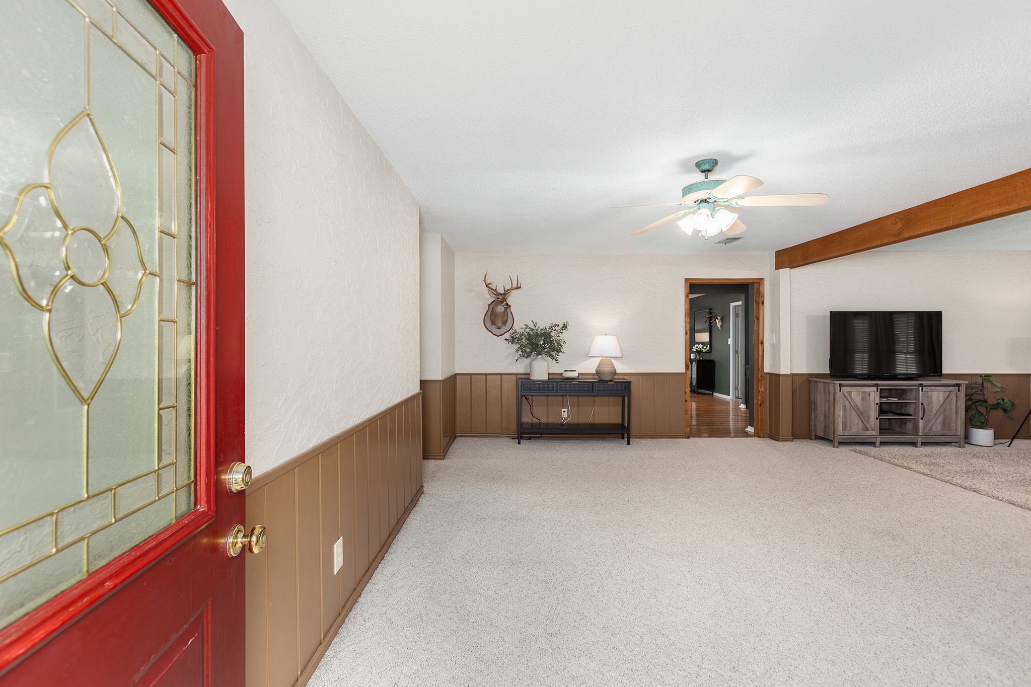 175 County Road 2005 Liberty, TX 77575 - Photo 7 of 42 a view of a livingroom with furniture and a flat screen tv