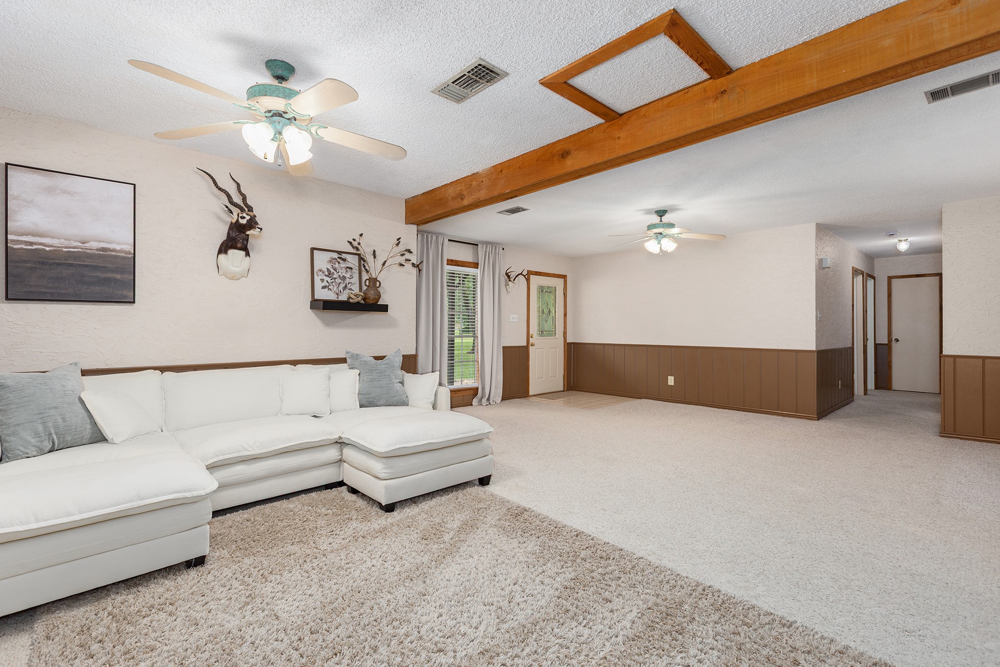 175 County Road 2005 Liberty, TX 77575 - Photo 10 of 42 a living room with furniture and a ceiling fan