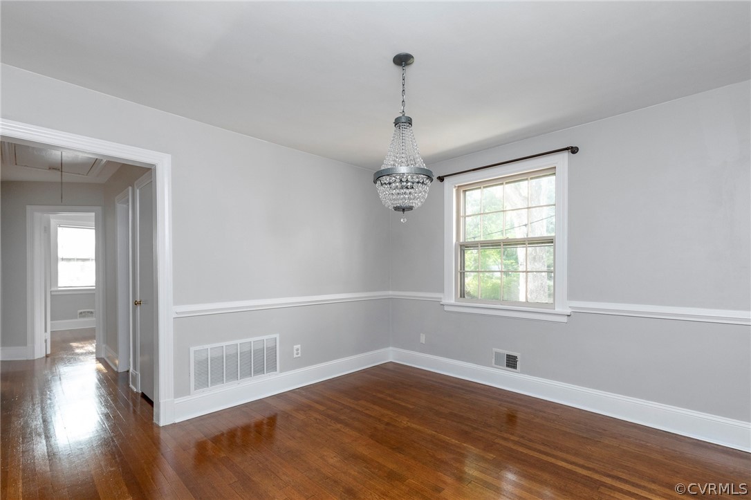 8811 Gayton Road Richmond, VA 23229 - Photo 10 of 39 Formal Dining room with chair rail and wood floors