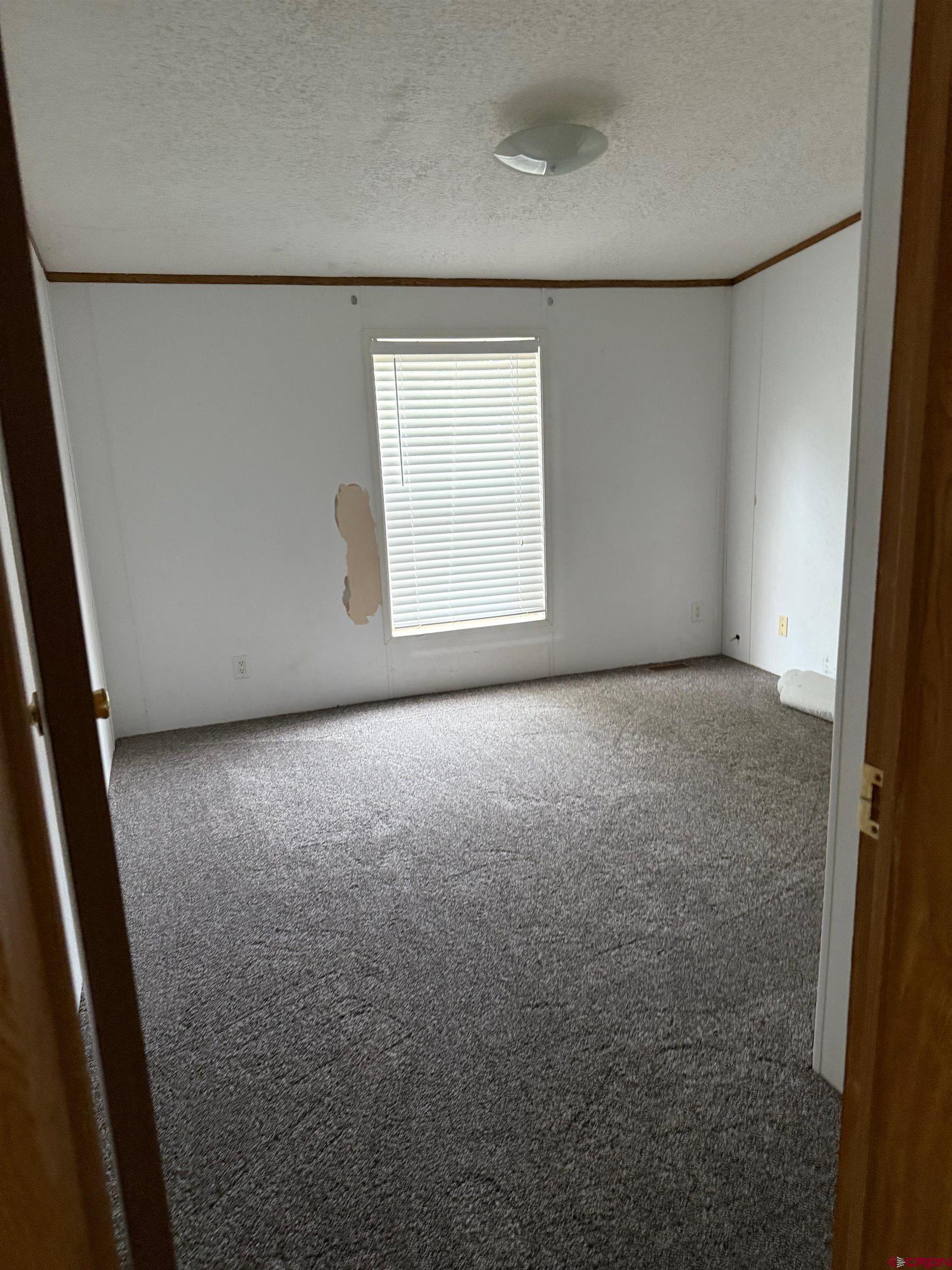 440 Park Drive Naturita, CO 81422 - Photo 15 of 18 a view of a room with window