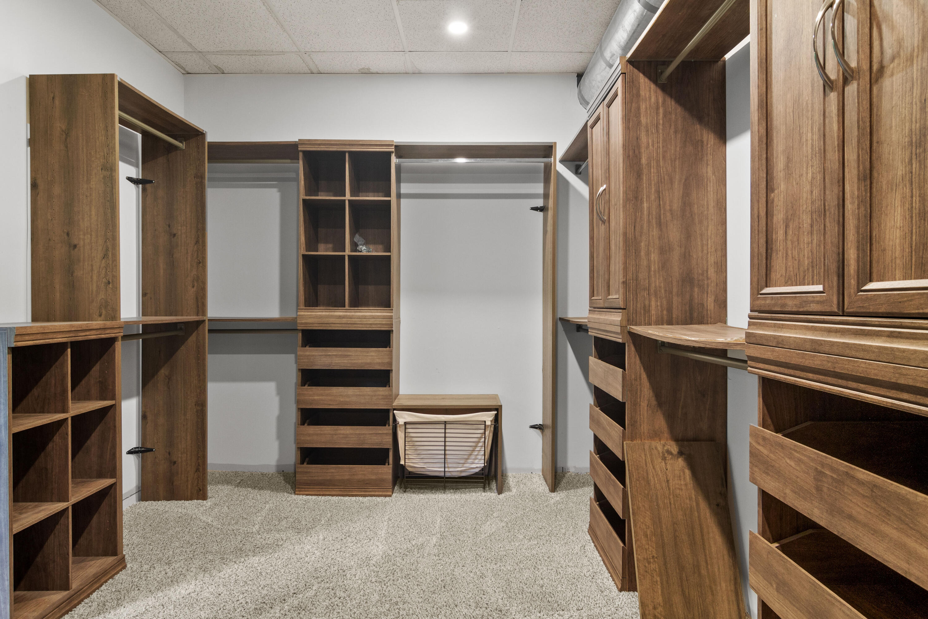 23102 Pierce Street Lowell, IN 46356 - Photo 24 of 32 a view of walk in closet with clothes and shoes