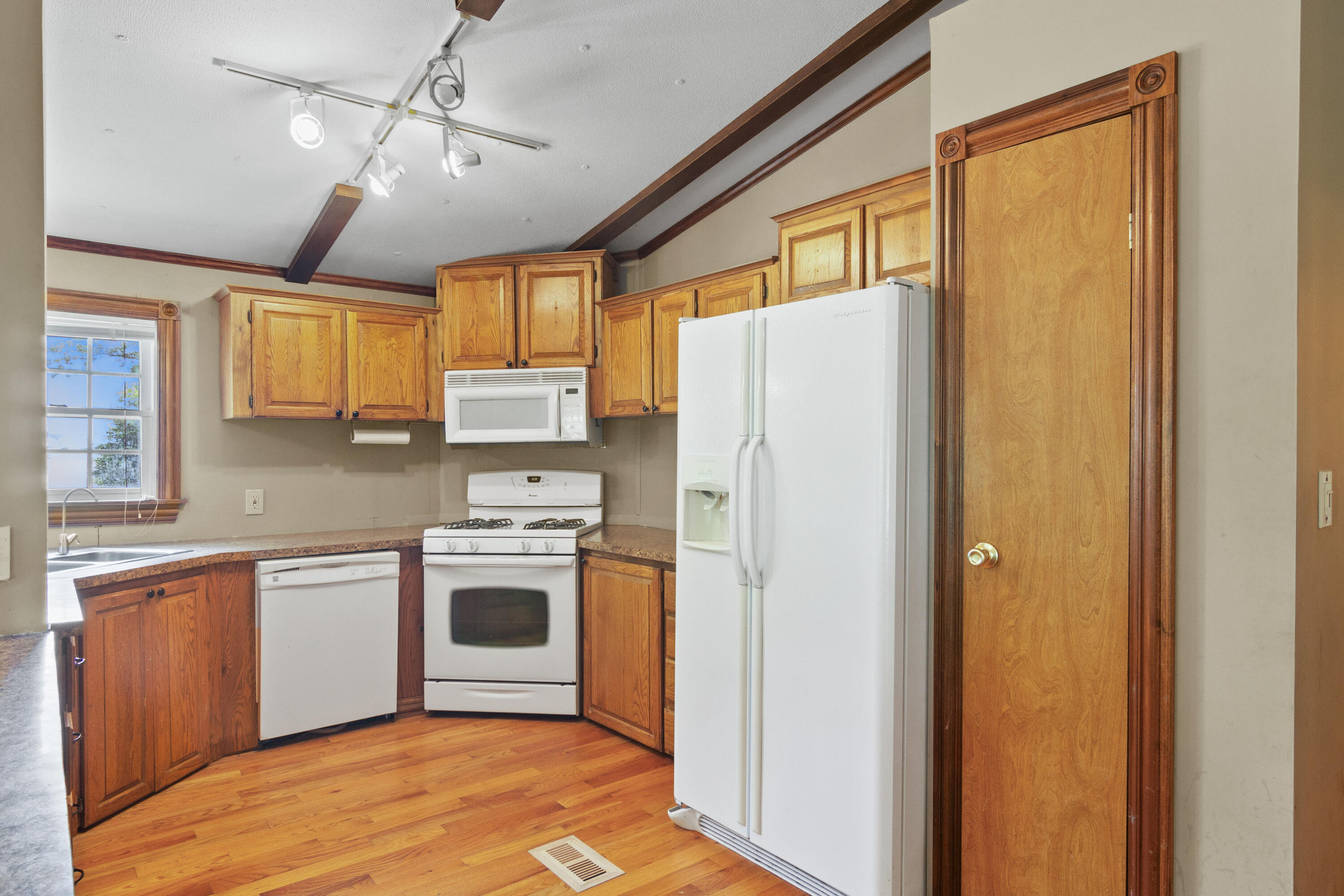23102 Pierce Street Lowell, IN 46356 - Photo 8 of 32 a kitchen with stainless steel appliances a refrigerator and a stove
