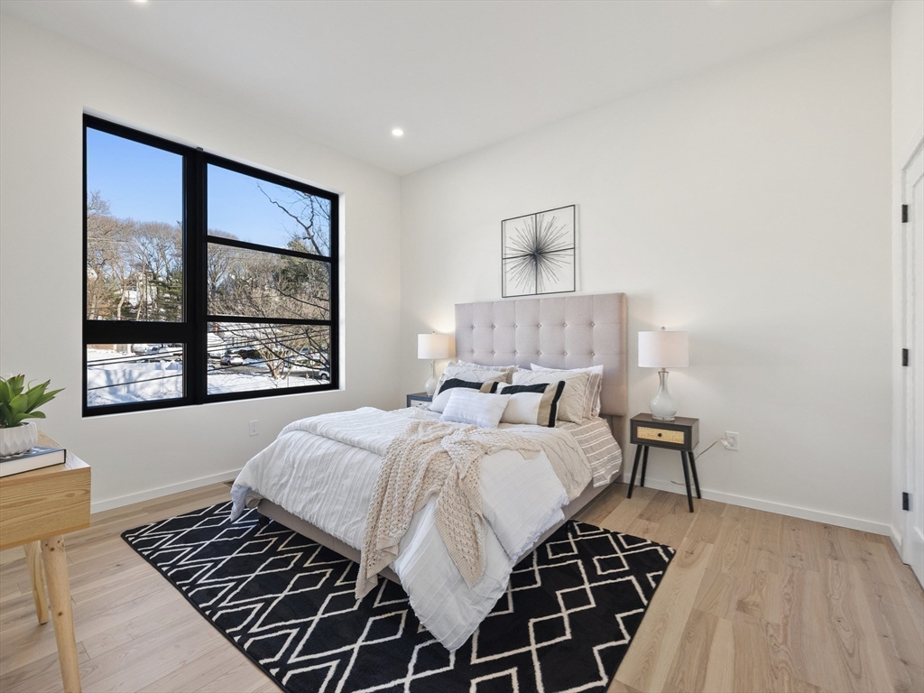 225 Walnut Street Saugus, MA 01906 - Photo 20 of 42 a bedroom with a bed and a window