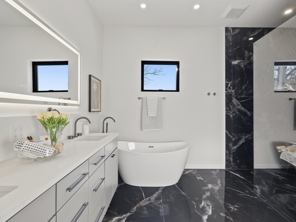 225 Walnut Street Saugus, MA 01906 - Photo 26 of 42 a bathroom with a sink and a toilet