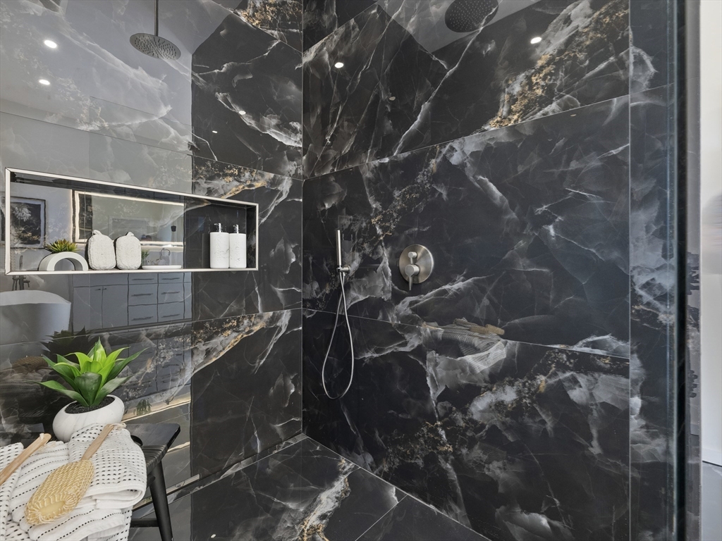 225 Walnut Street Saugus, MA 01906 - Photo 27 of 42 a vase of flowers sitting on a table