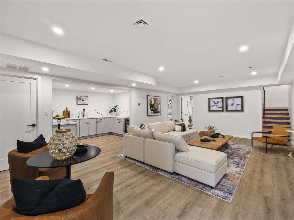 225 Walnut Street Saugus, MA 01906 - Photo 31 of 42 a living room with furniture and a wooden floor