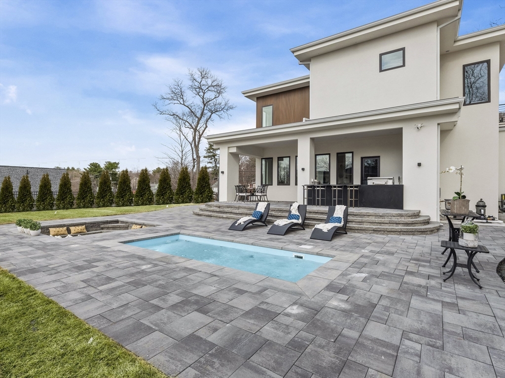 225 Walnut Street Saugus, MA 01906 - Photo 5 of 42 a view of a house with backyard porch and sitting area