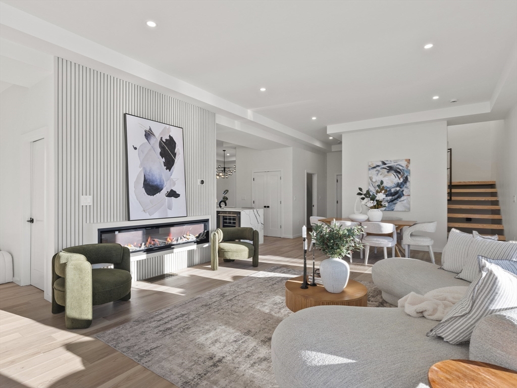 225 Walnut Street Saugus, MA 01906 - Photo 8 of 42 a living room with furniture and wooden floor